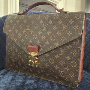 $2430 LV Monogram Top Handle Bag (rubbing inside)